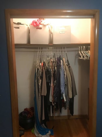 Reviewer photo showing clothes on space-saving hangers