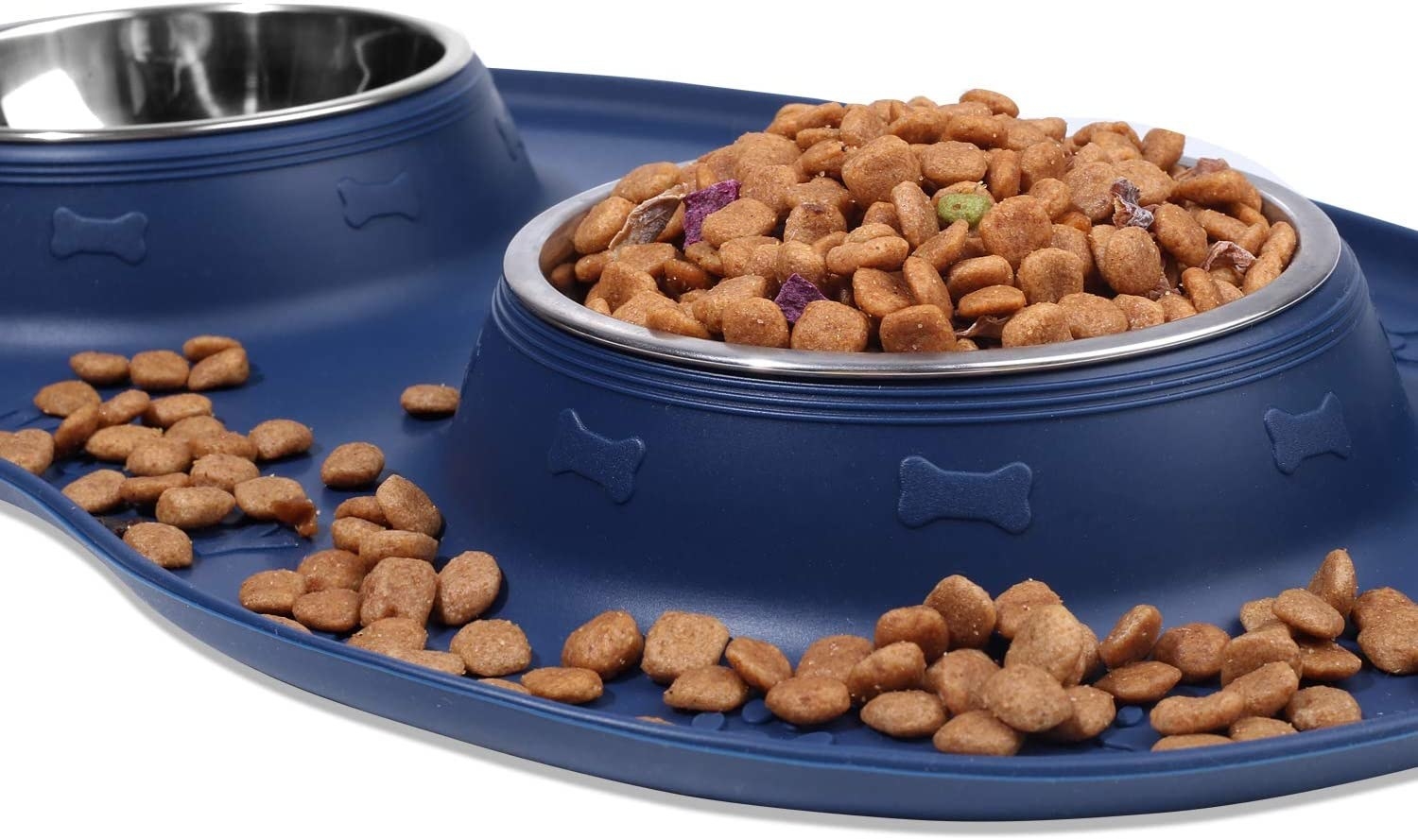 The bowl and mat set with kibble filling both the bowl and spilt on the mat