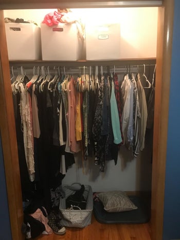 Reviewer photo showing closet full of clothes on regular hangers
