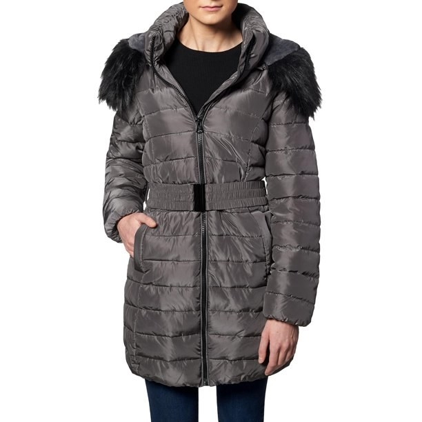 Model in faux fur puffer coat