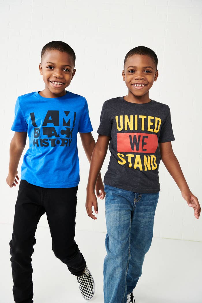 Two young boys wearing the original Kohl's design shirts.