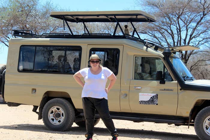 Rebel standing in front of a truck