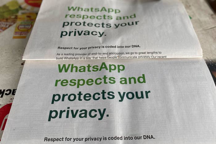 Newspapers with front-page advertisements of Facebook&#x27;s WhatsApp in a Mumbai newspaper stall