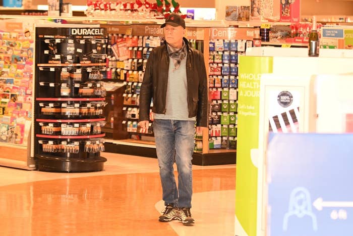 Bruce Willis is spotted walking around Rite-Aid without wearing a mask