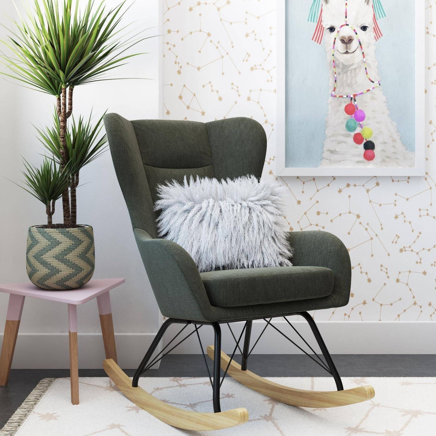 A dark gray rocking chair with black metal legs and wooden feet