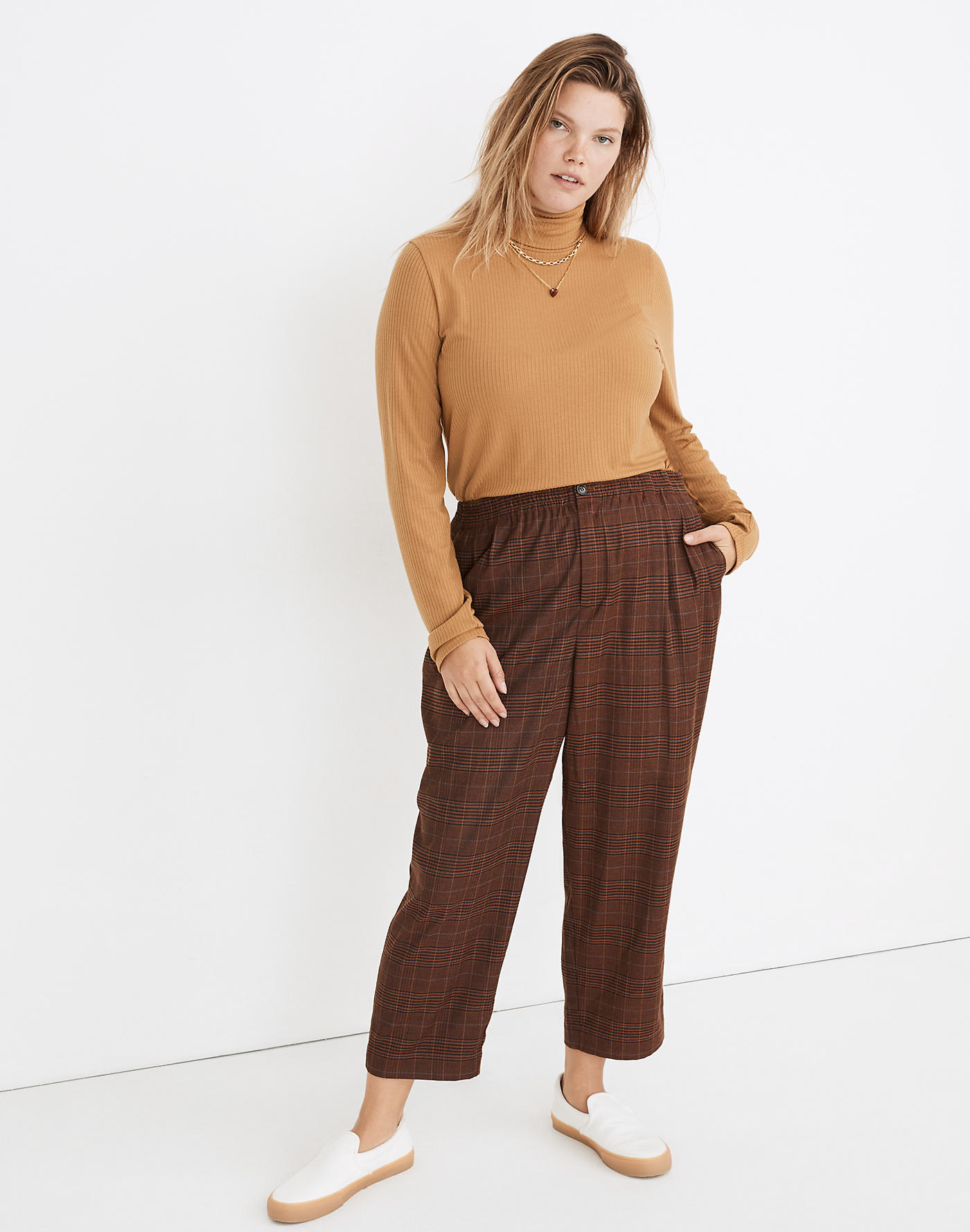 model wearing plaid pants