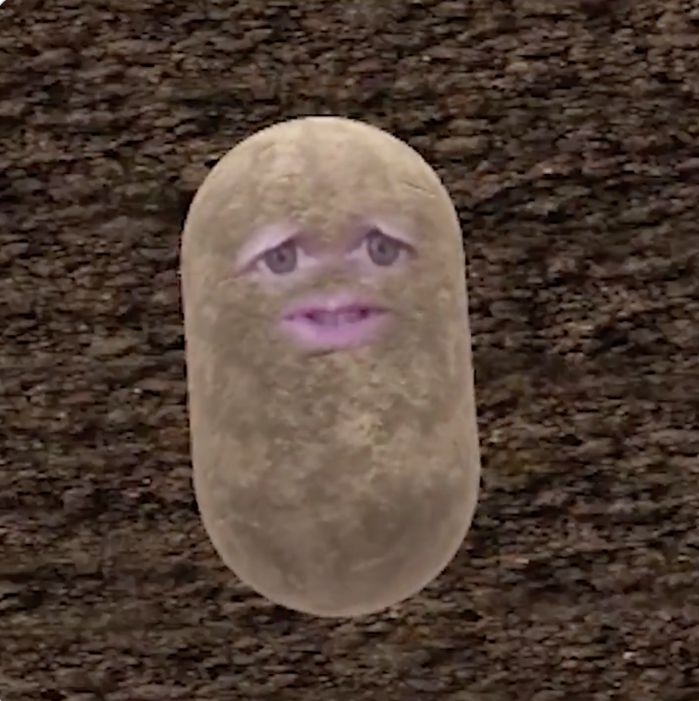 A disconcerting potato with human eyes and a mouth and teeth