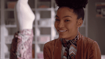Yara Shahidi gives a cheeky smile in an episode of &quot;Grown-ish&quot;