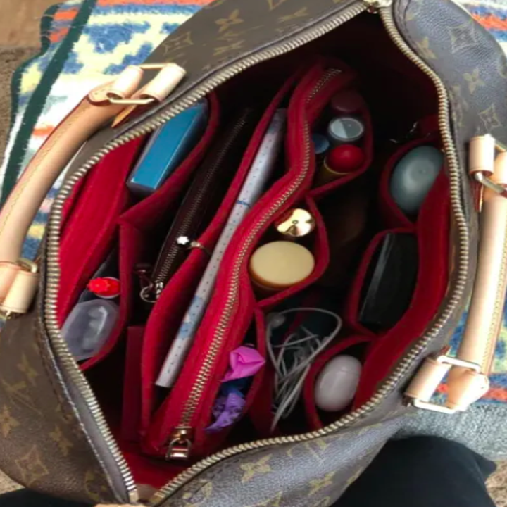 The same purse now looking clean and orderly with the organizer inside of it
