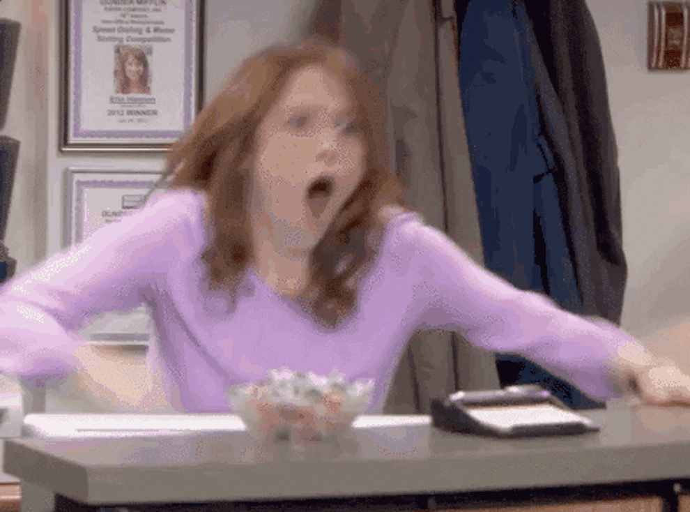 Gif of Erin from The Office pumping her fist and yelling in excitement 