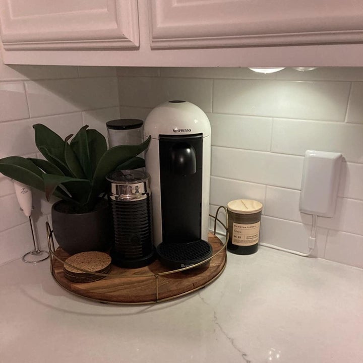 A reviewer's photo of the outlet being used in a kitchen
