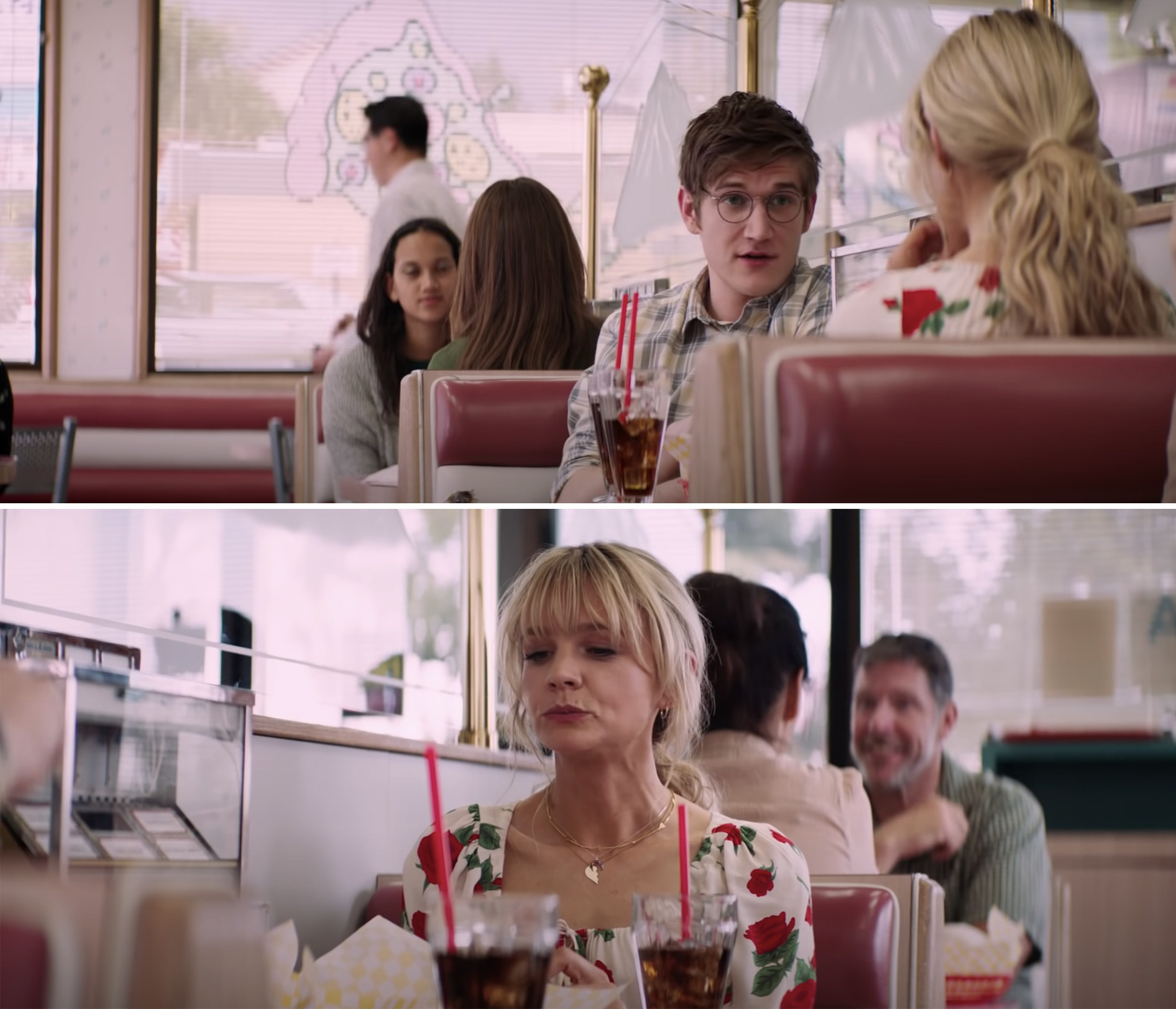 Cary and Bo sitting in a restaurant booth in Promising Young Woman