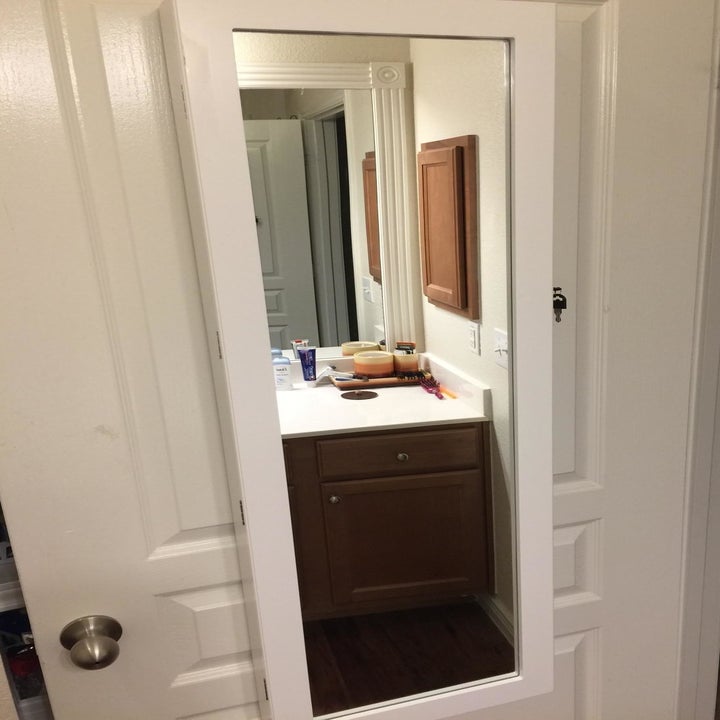 reviewer photo showing the jewelry organizer with mirror door closed