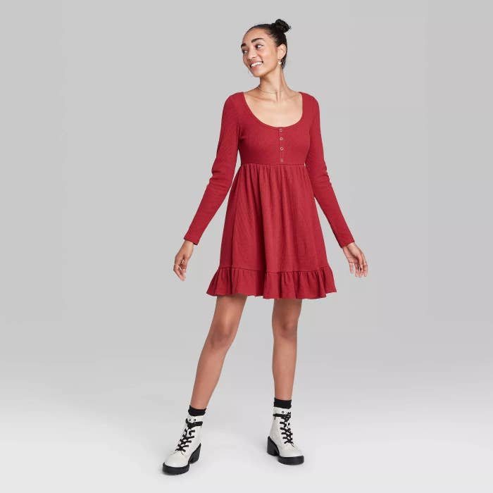 model wears red waffle knit mini dress 