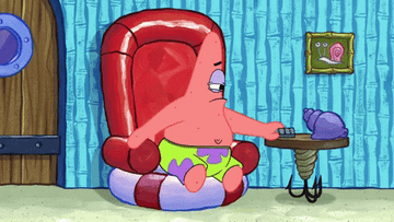 Patrick from &quot;Spongebob&quot; sitting on a chair and grabbing a remove to turn on the TV