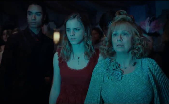 Regé-Jean Page standing next to Emma Watson and Julie Walters