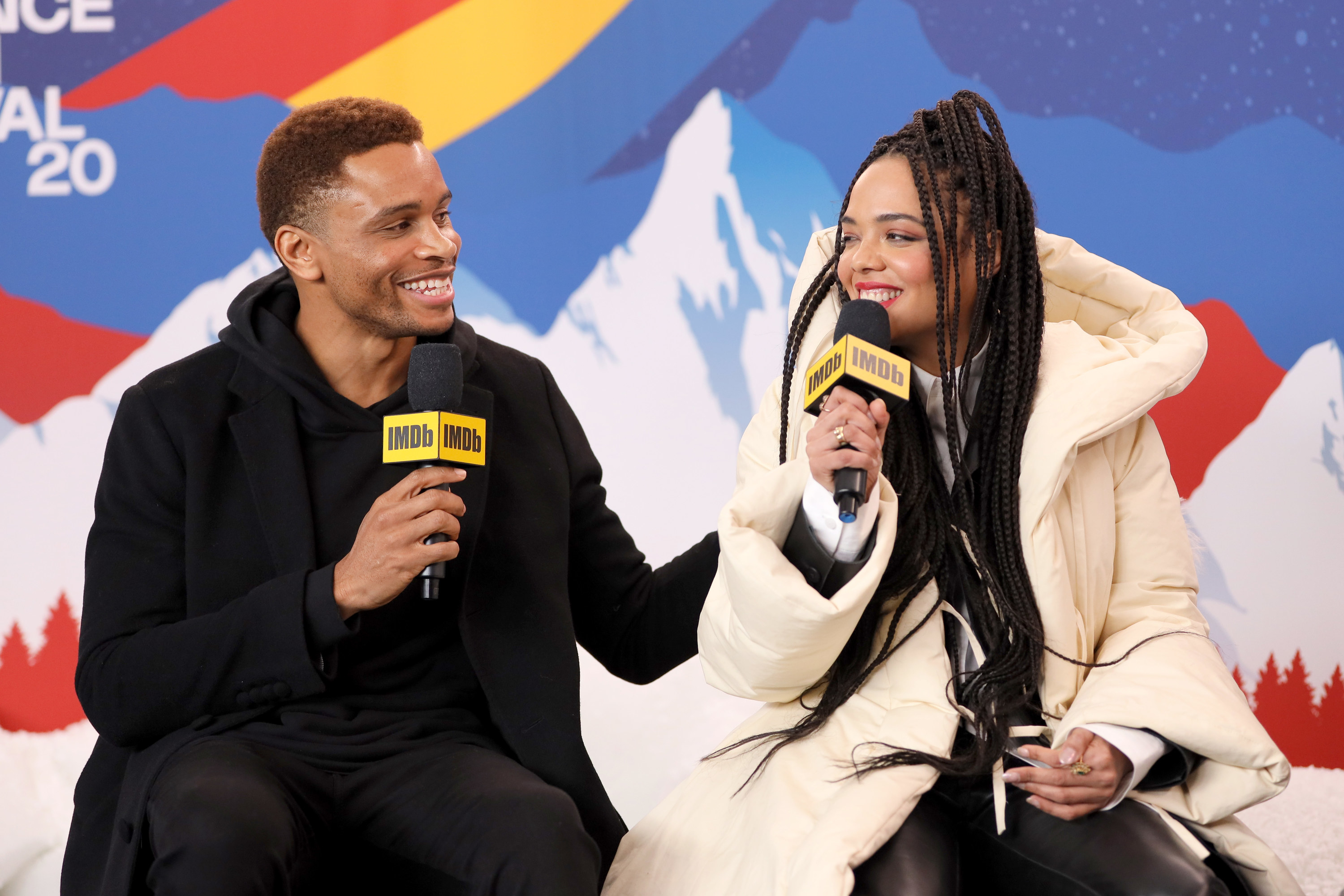 Nnamdi and Tessa smile at each other