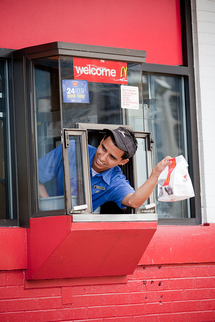Marvin Mateo works the drive thru window at McDonald&#x27;s in Washington, DC