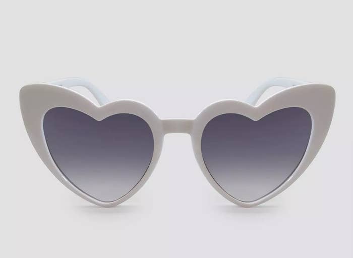 a pair of white heart shaped sunglasses 