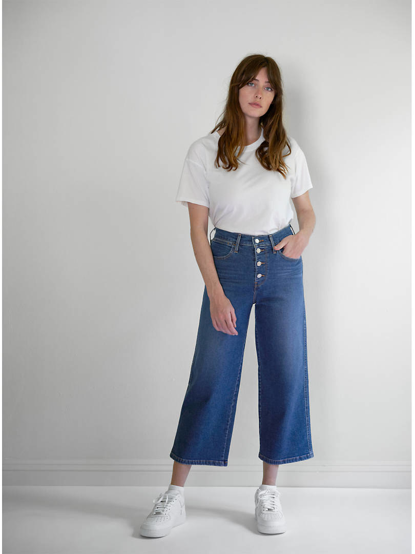 model wearing wide leg flair pants