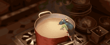 Remy from &quot;Ratatouille&quot; adding ingredients to a pot of soup