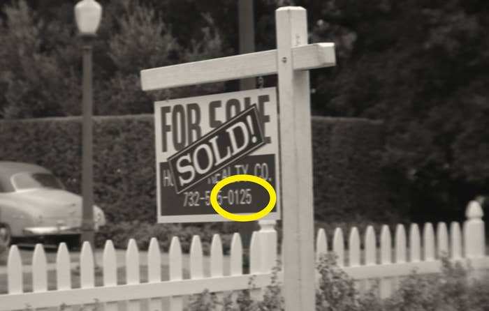A real estate sign with the numbers "0125" circled