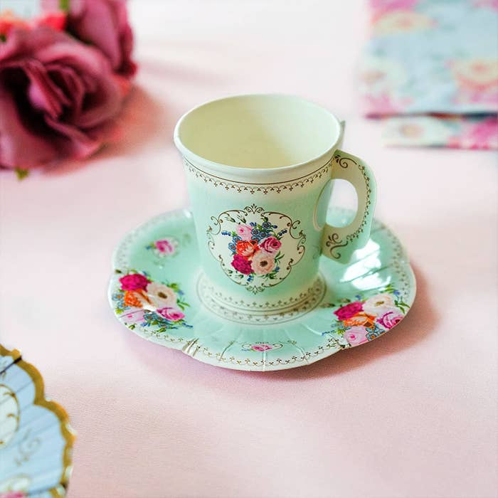 A paper teacup on a paper saucer
