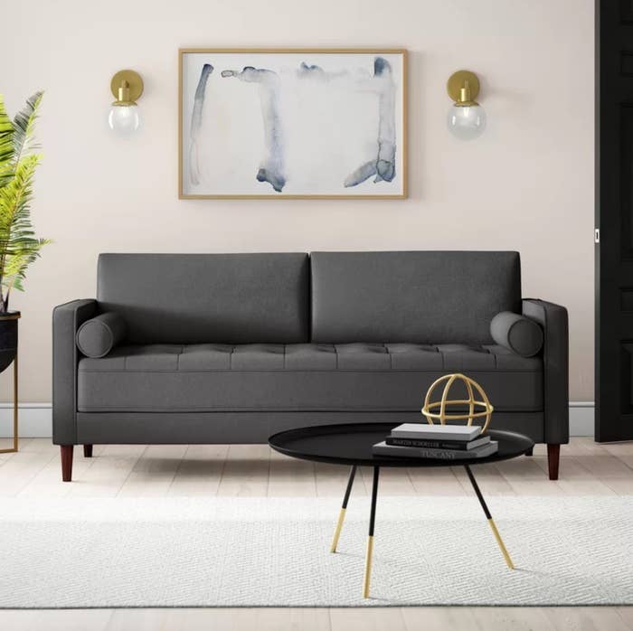 The square armed sofa in heather gray.