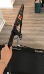 GIF of me folding the Treadly 2 Pro handrail up and down