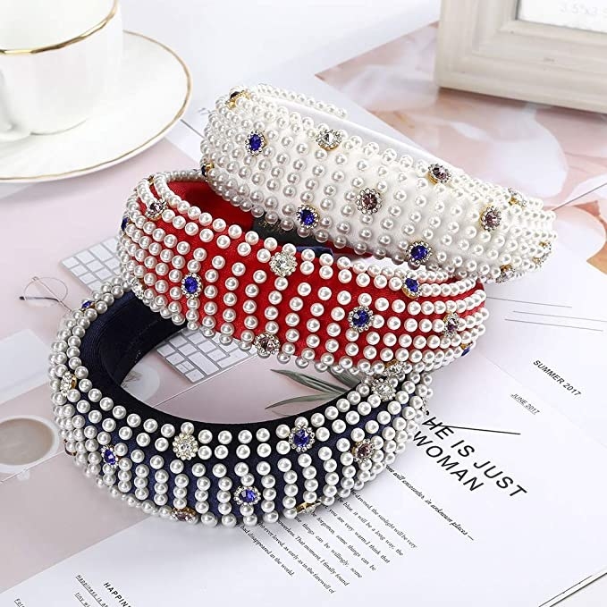 Three headbands stacked in a pile
