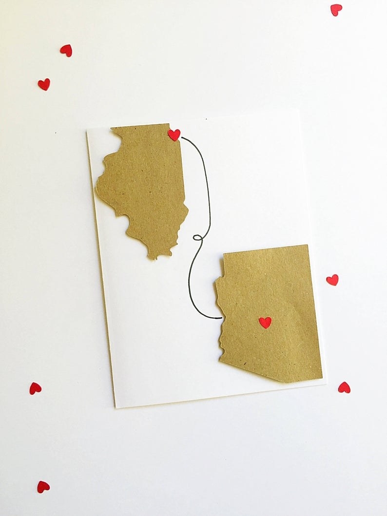 The card with paper cutouts of Illinois and Arizona, with a little heart dot on each state and a curvy line between them