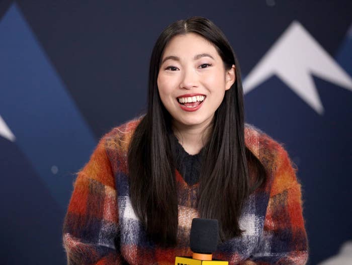 Awkwafina smiling at an event