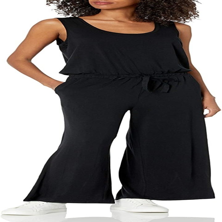 Model wearing black jumpsuit