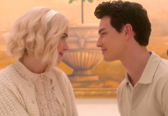 Sabrina and Nick staring lovingly at each other