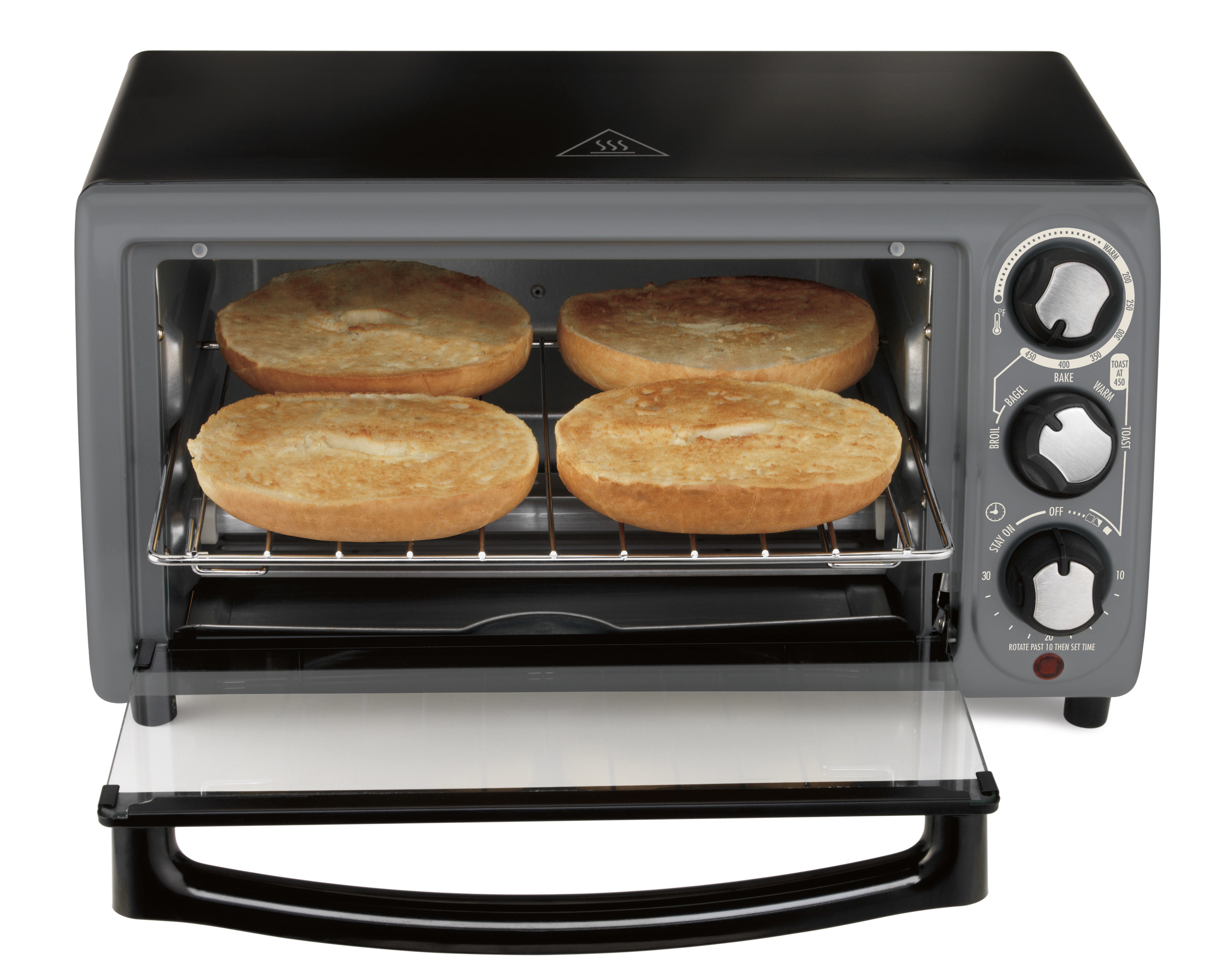 the toaster oven with bagels toasting inside