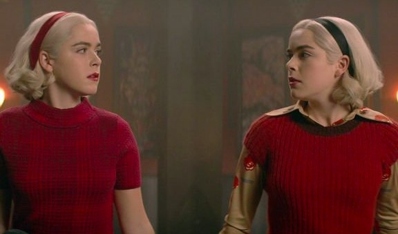 The two Sabrinas look at each other