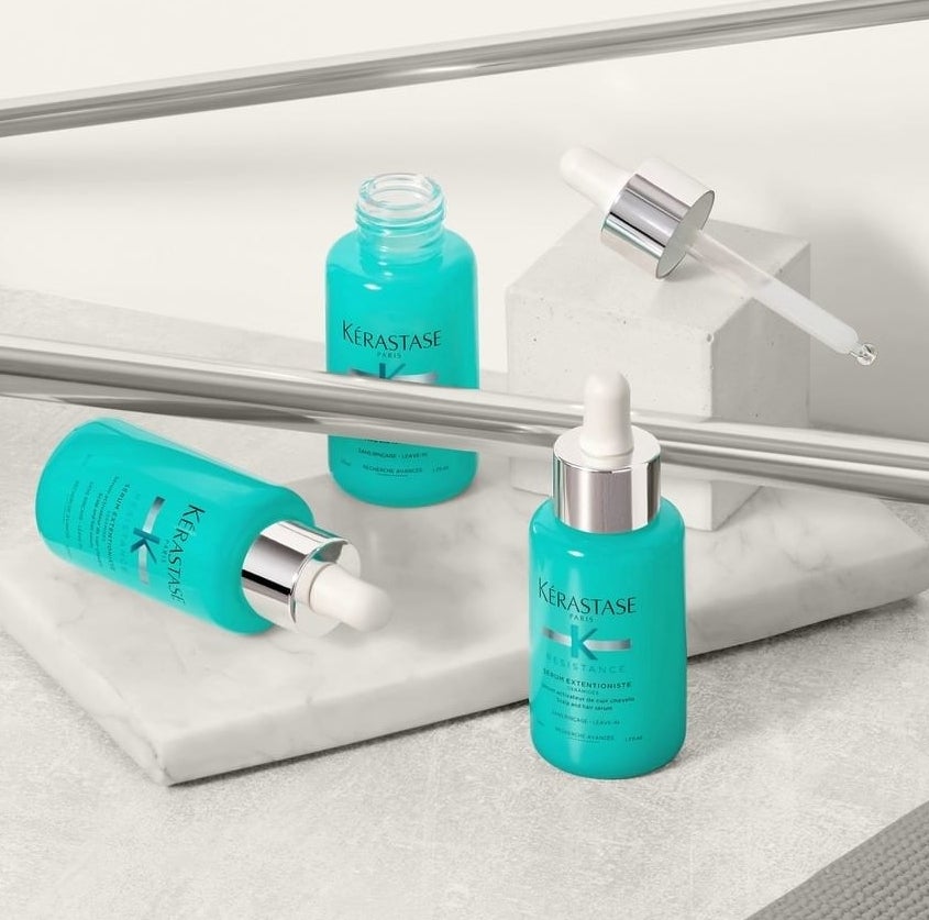Three bottles of the serum on a counter