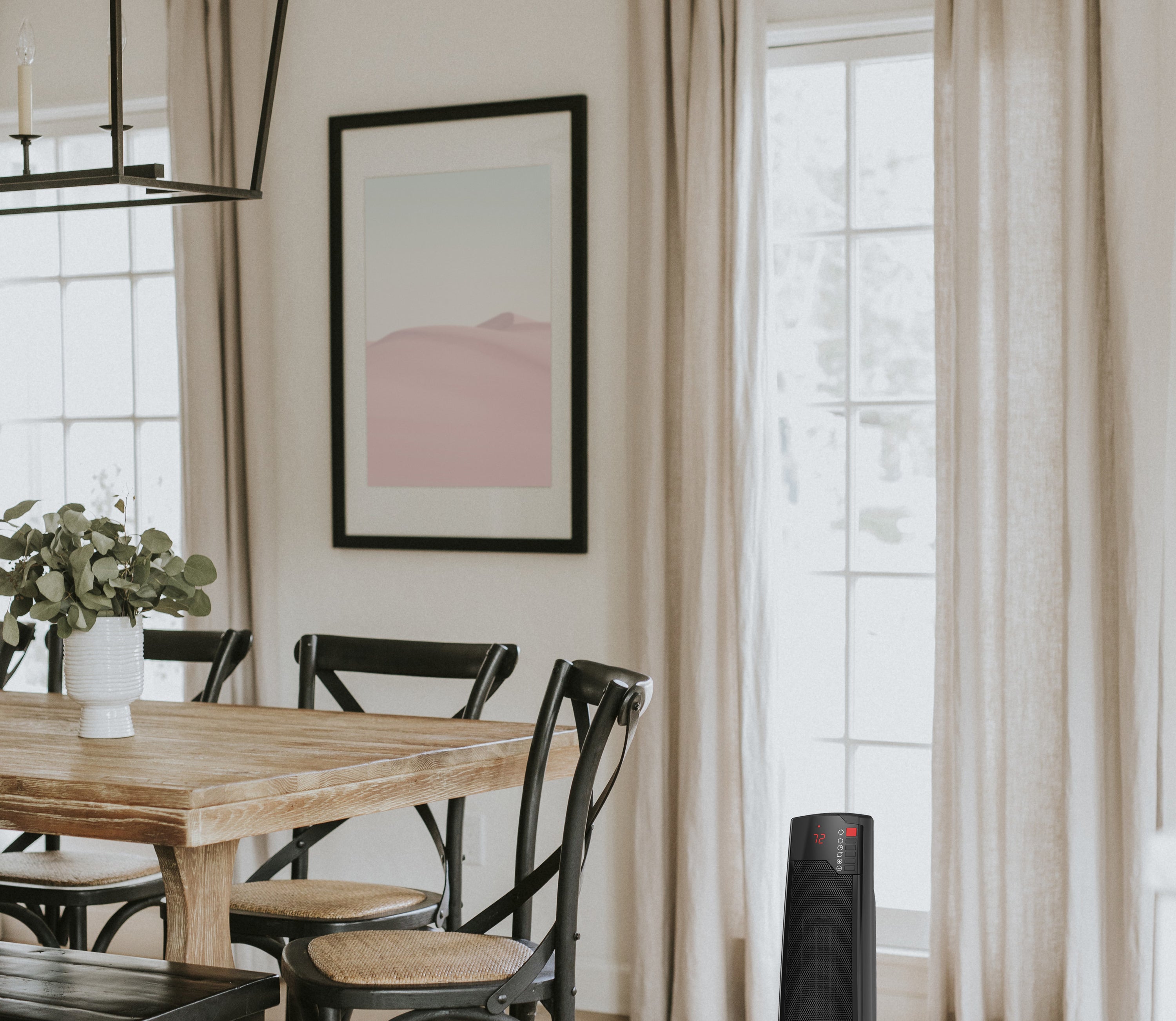 space heater on the floor next to a kitchen table