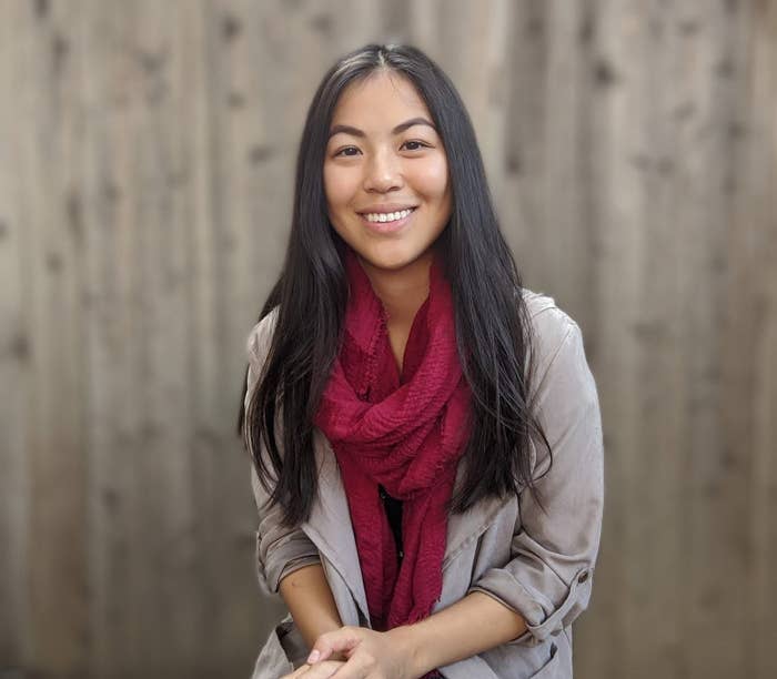 a portrait of the author smiling
