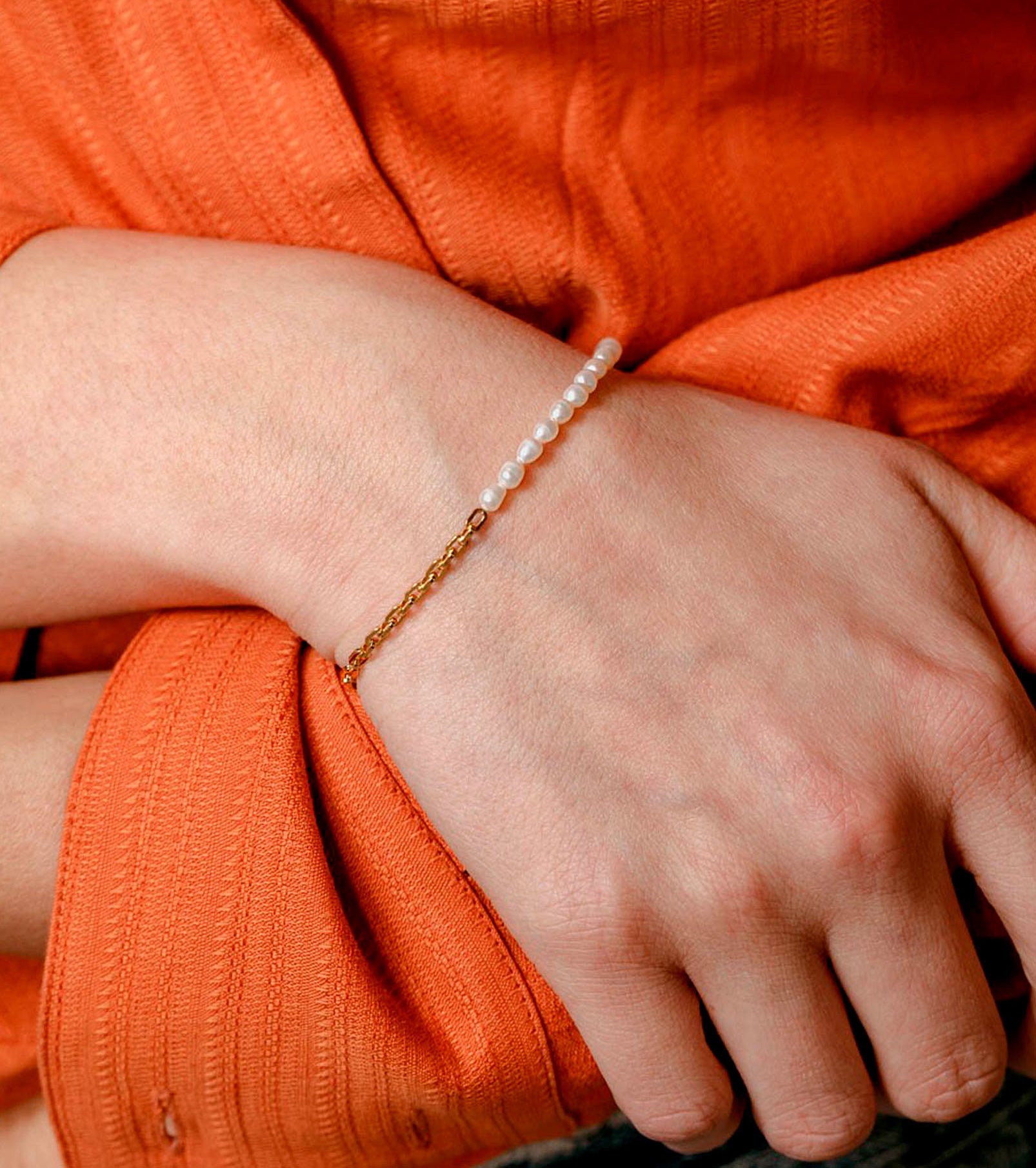 A person wearing the bracelet on their wrist