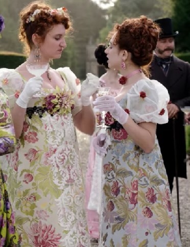 The Featherington sisters wear floral print dresses with lace and flower details