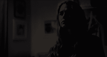 GIF of Madison Iseman in &quot;Fear of Rain&quot; looking out the window with a concerned look on her face.