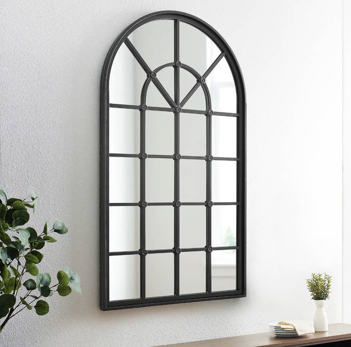 A black windowpane mirror