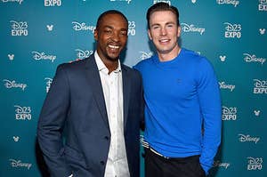 Anthony Mackie and Chris Evans posing together at a red carpet event