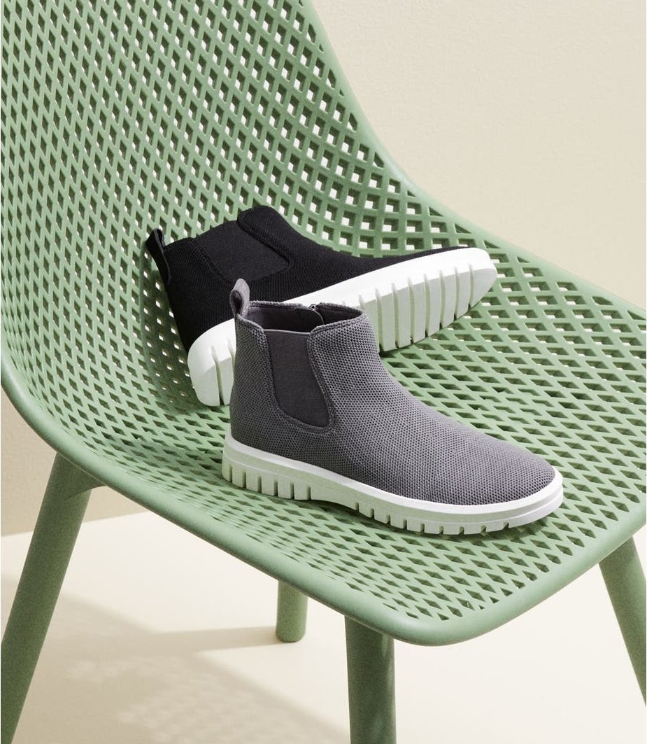 the bootie with white chunky sole and knit panel on either side in grey and black
