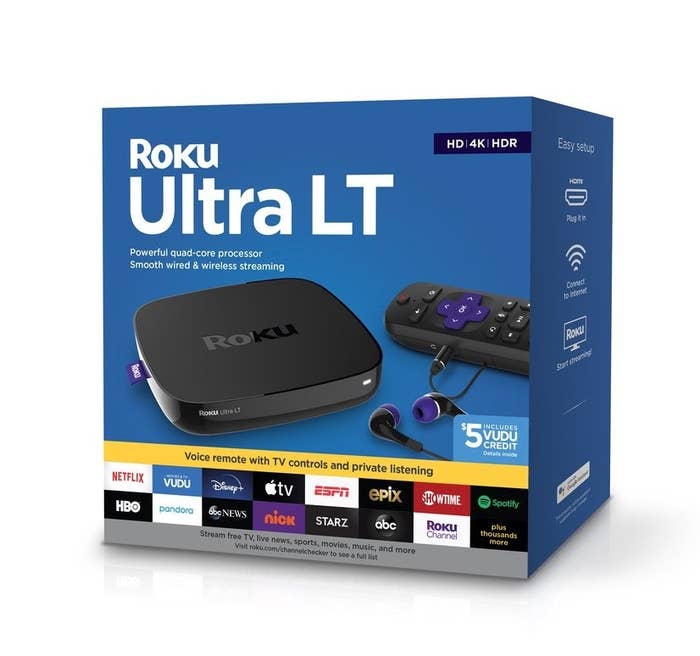 The blue Roku packaging with a photo of the streaming player and remote