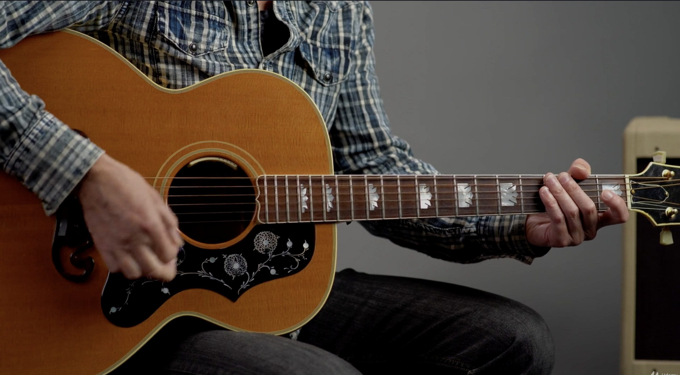 person holding a guitar