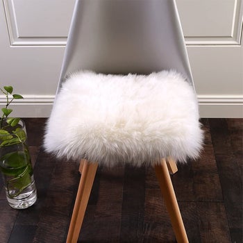 The faux fur seat cover in white