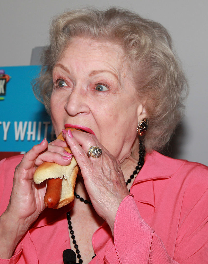 Betty eating a hot dog