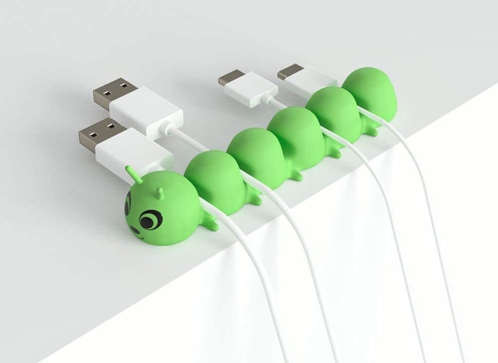 The green caterpillar cord organizer which can hold six cables 